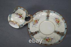 Limoges Hand Painted Floral Ivory & Blue Raised Gold Demitasse Cup & Saucer