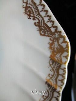 Limoges Hand Painted France Shell Shaped 9 Snack Plates 9 1/4 Gold Encrusted
