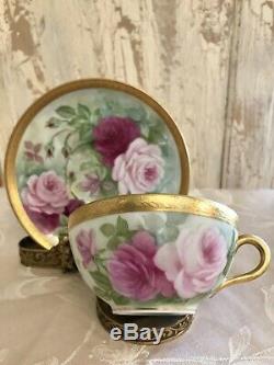 Lovely Limoges France hand-painted roses cup and saucer set