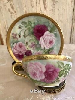 Lovely Limoges France hand-painted roses cup and saucer set