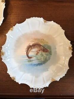 Set of 12 Antique Hand painted gold limoges Fish gaming plates & 1 large plate