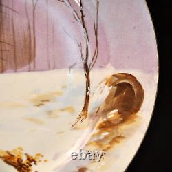 Assiette Coronet Limoges 10 1/4 peinte à la main scène de la forêt d'hiver René dorée années 1920