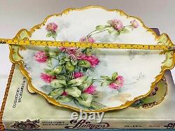 Assiette de fleurs peinte à la main de Limoges T&V France, antique, signée, avec bordure en or.