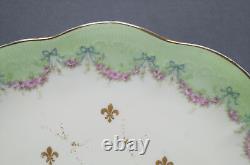 Assiette décorée à la main de Madame Lamballe en rose et or de Pouyat Limoges