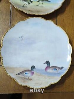 Ensemble de 6 assiettes de cabinet de jeu de canards peintes à la main de Limoges, signées par l'artiste.