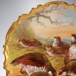 Grande assiette en porcelaine peinte à la main de Limoges avec des oiseaux signée 12 par B&H