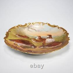 Grande assiette en porcelaine peinte à la main de Limoges avec des oiseaux signée 12 par B&H