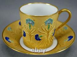Tasse et soucoupe en porcelaine de Limoges, peinte à la main avec des fleurs de bleu de chardon et de l'or